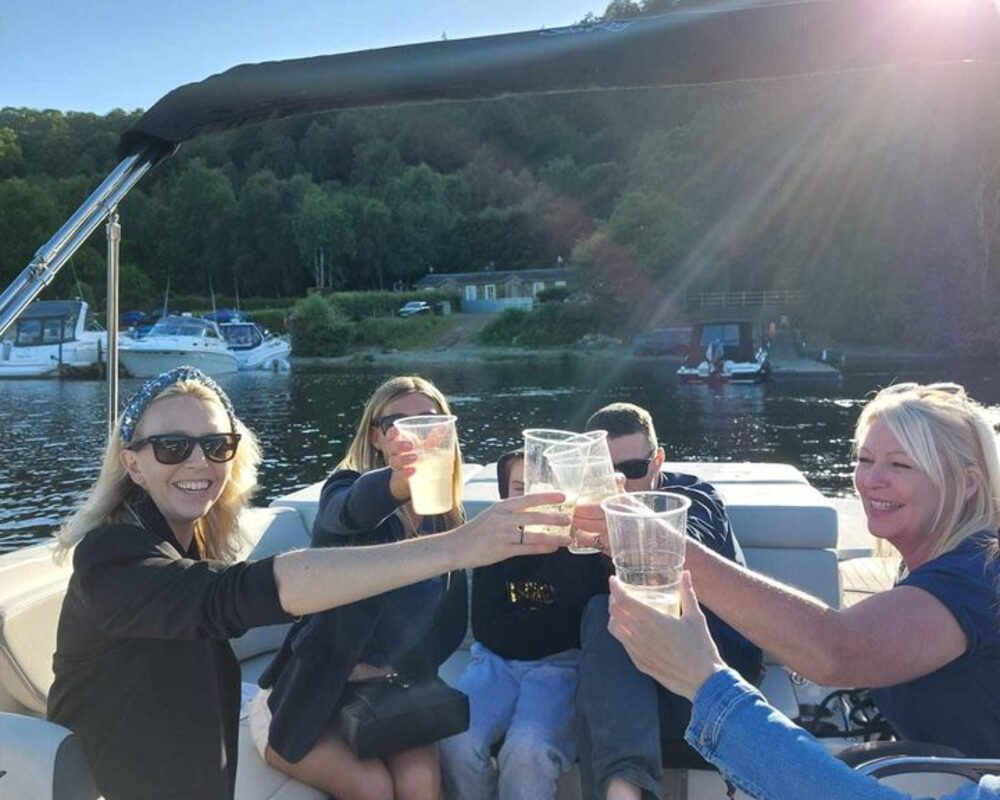 Members celebrating on the water